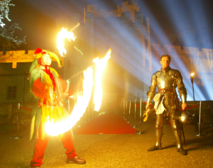 Fire juggler and knight in armour