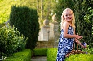 Young villager, Isabella Potter, helping to prepare the garden of the late Sir Hardy Amies